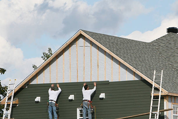 Professional Siding Installation technician working in Manchester, OH